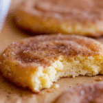 Fluffy snickerdoodle cookie with bite mark