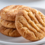 Rustic Pumpkin Spice Cookies cooling on a baking tray with scattered fall spices.