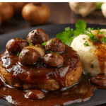 Savory mushroom gravy poured over a juicy beef Salisbury steak.