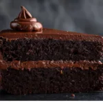 Triple layer dark chocolate cake with frosting.