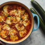Gluten-Free Zucchini Hamburger Casserole with bubbly cheese and fresh herbs.
