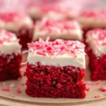 Close-up texture of pink coconut snowball cake bars.