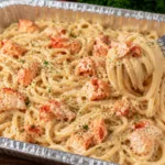Close-up of creamy lobster alfredo pasta in a bowl